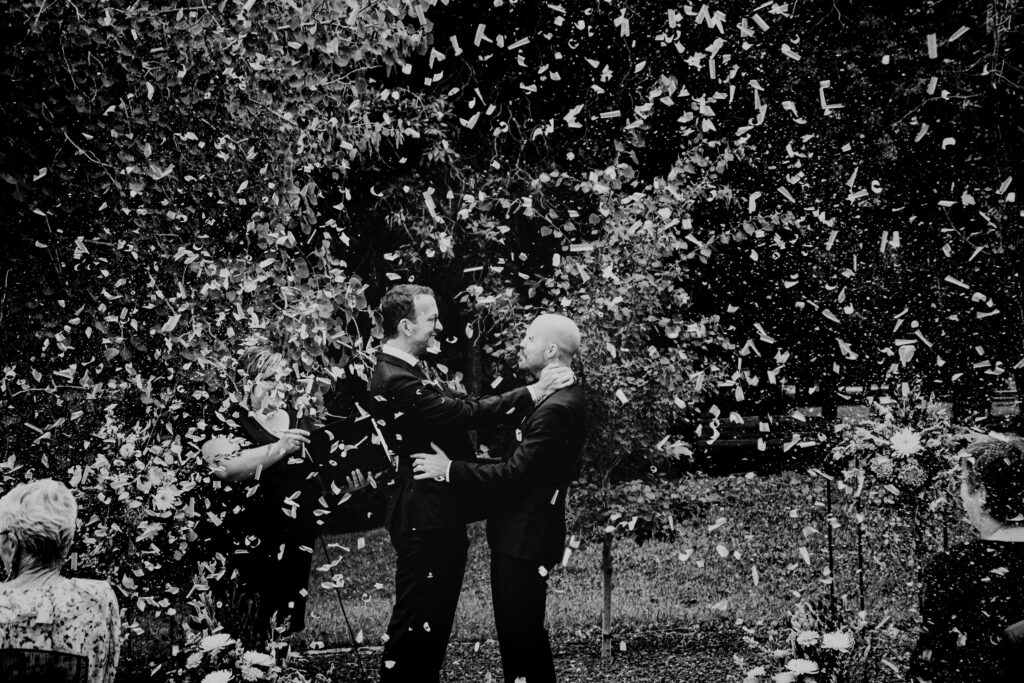 Wedding Ceremony, couple about to kiss with Confetti 
